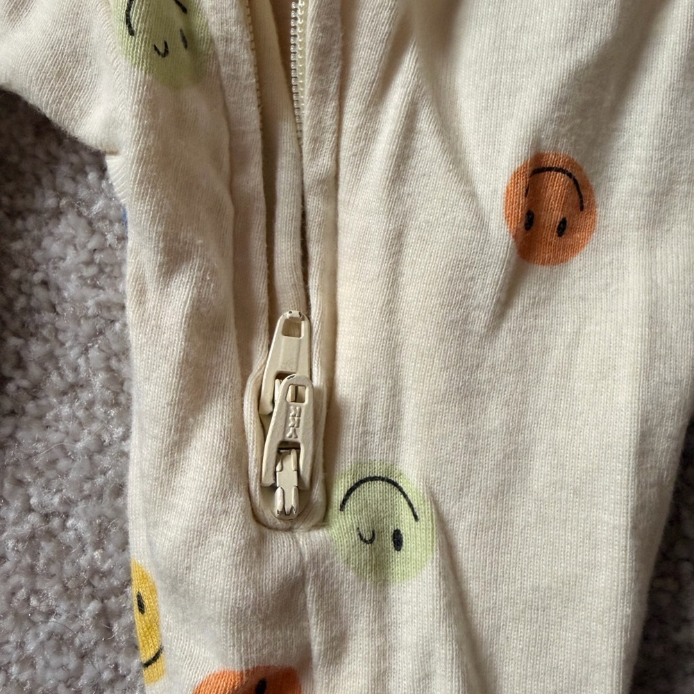Old Navy Cream Smiley Face Footed One-Piece - Picture 3 of 5